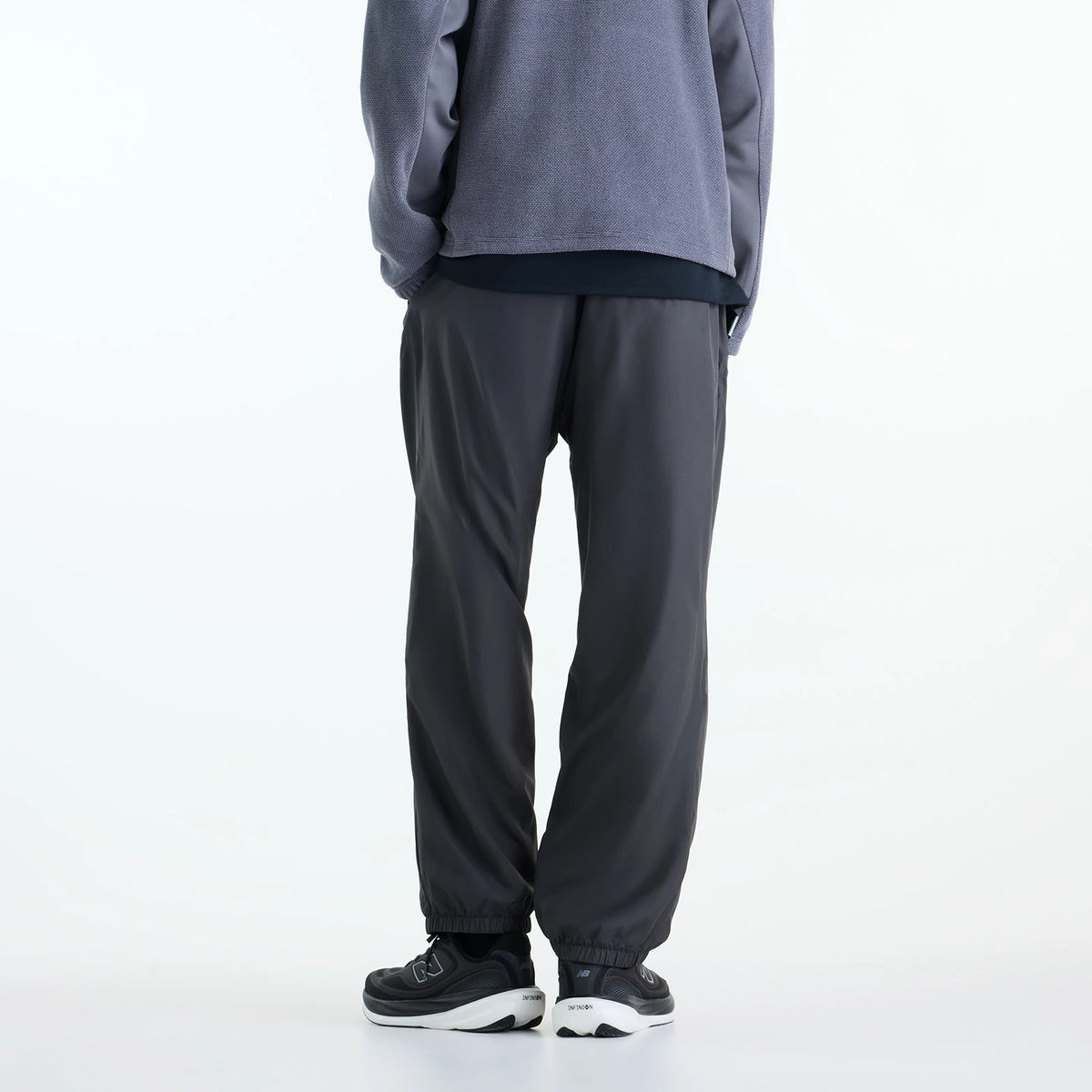 ニューバランスNEWBALANCEメンズウーブントラックパンツ裏トリコット起毛ジョガーパンツ撥水リラックスフィット秋冬ブラックセメントBLKMB6240FXmb6240fx-blk